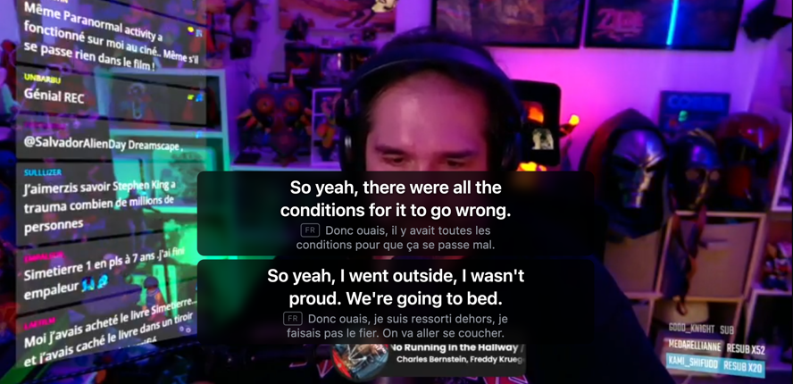 Twitchのライブ配信で、フランス語の発言と英訳字幕がプレイヤー上に表示されている画面。